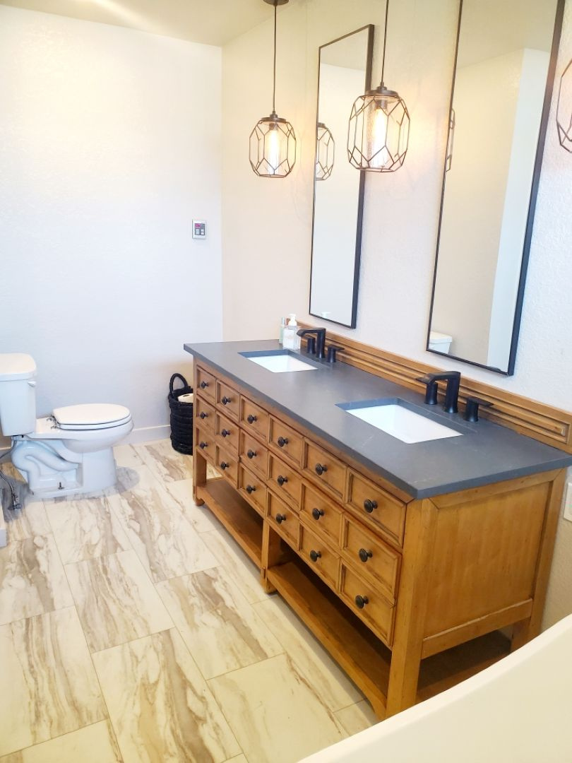 Black countertops in a bathroom